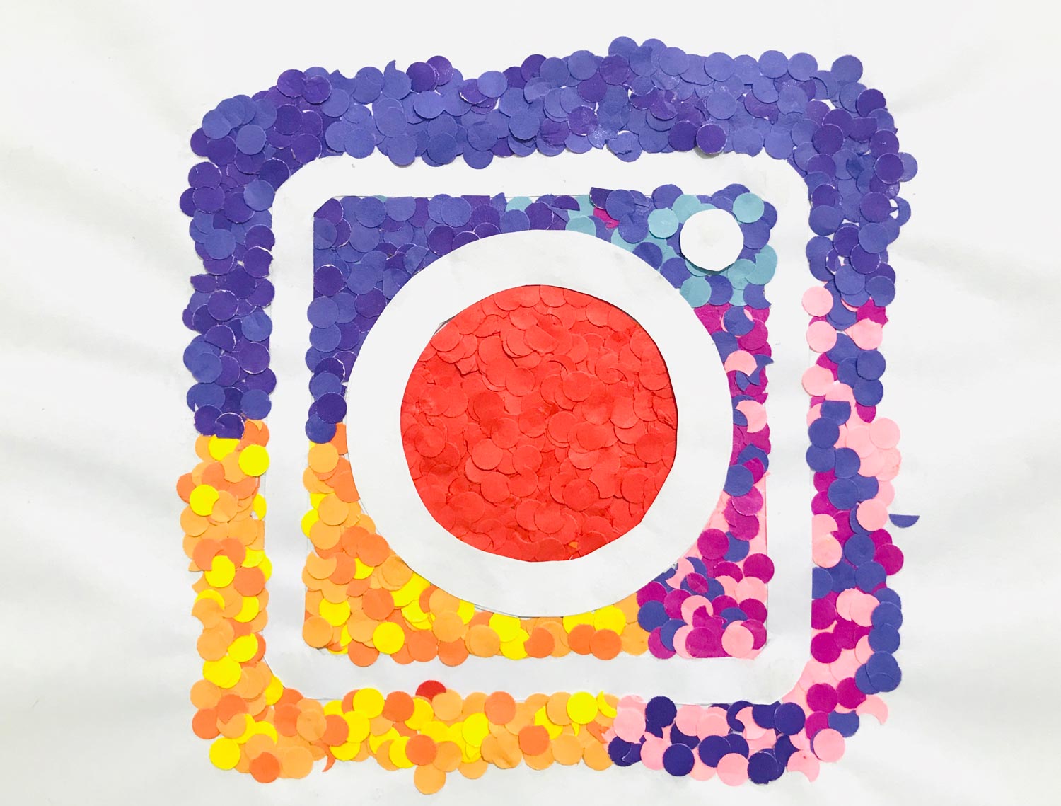 Instagram logo with colourful paper circles